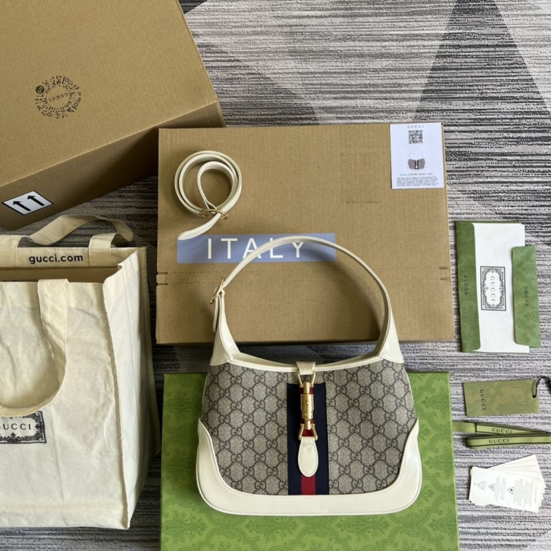 G*u*i top handle bags